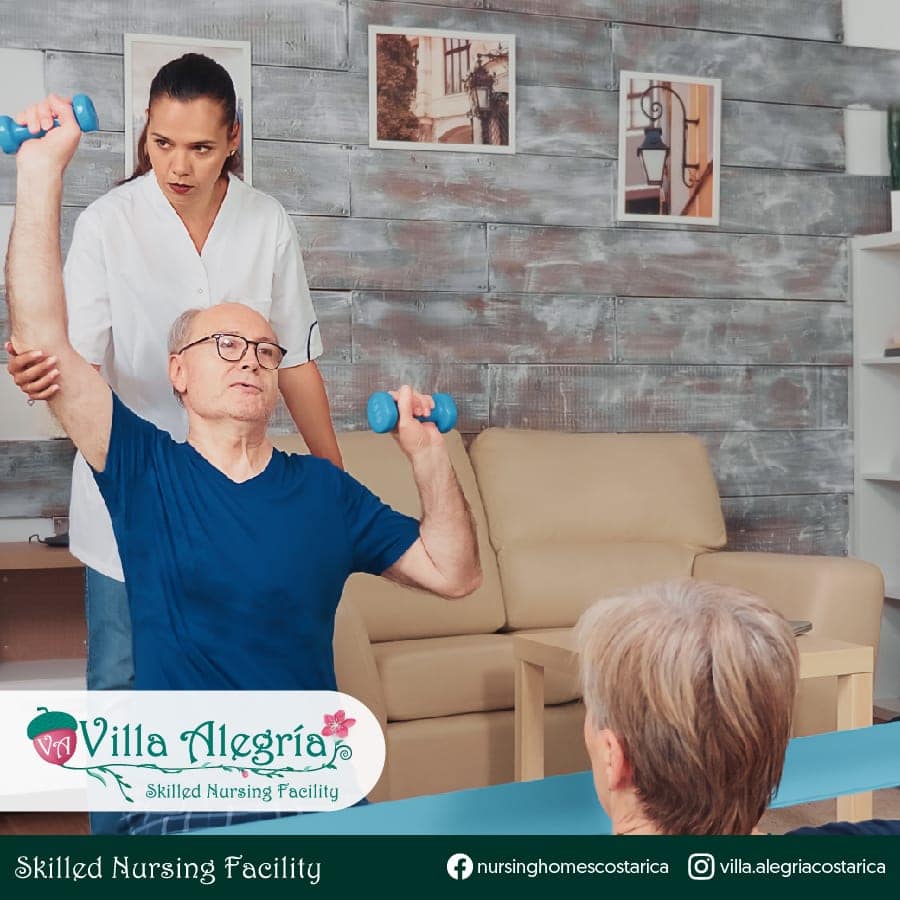 Don Felipe exercising with the physical therapist