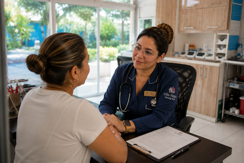 Family caregiver speaking with a clinical director about personalized care options for an older adult at Villa Alegría Nursing Home.